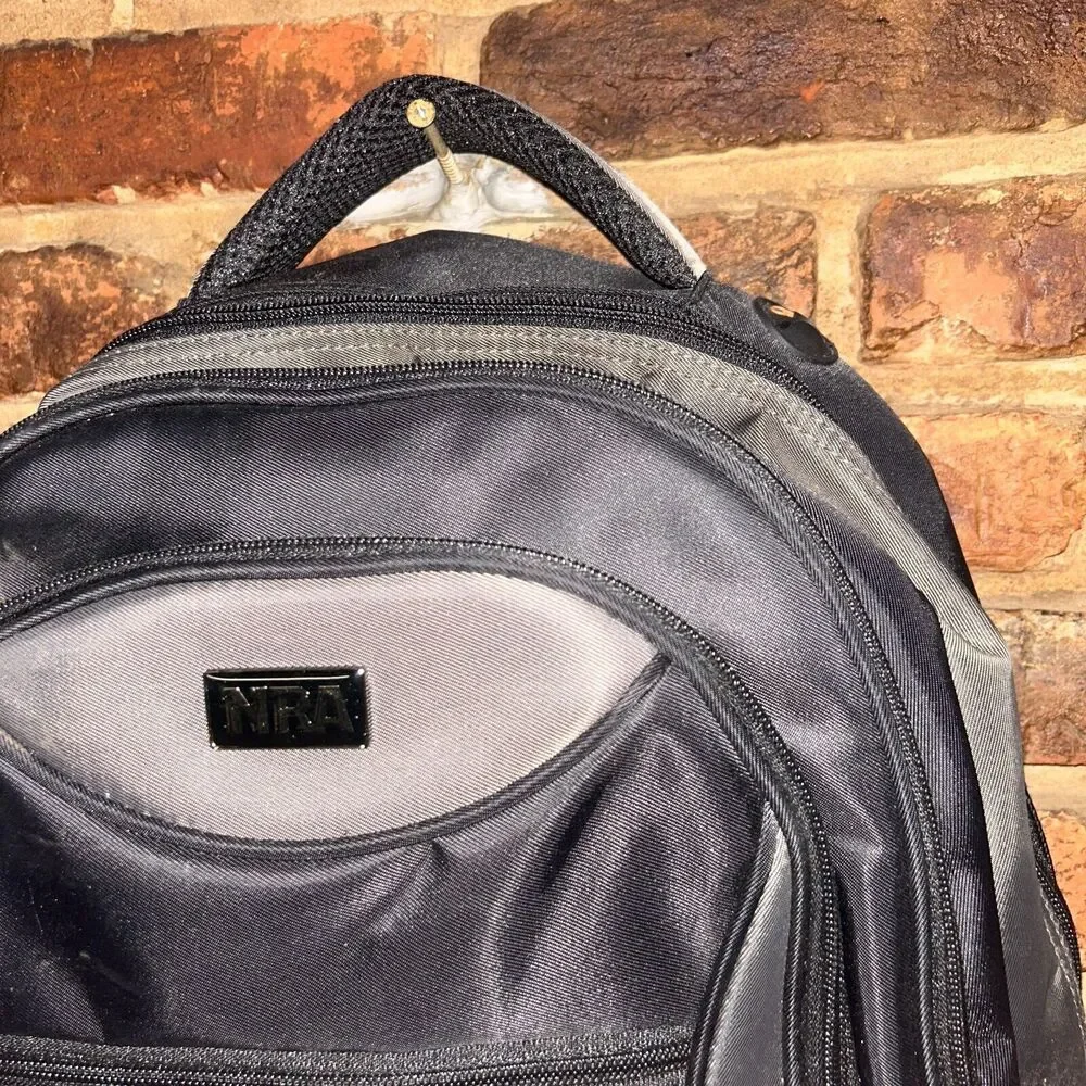 NRA Logo Backpack Tan And Black With 4 Compartments And Water Bottle Holder